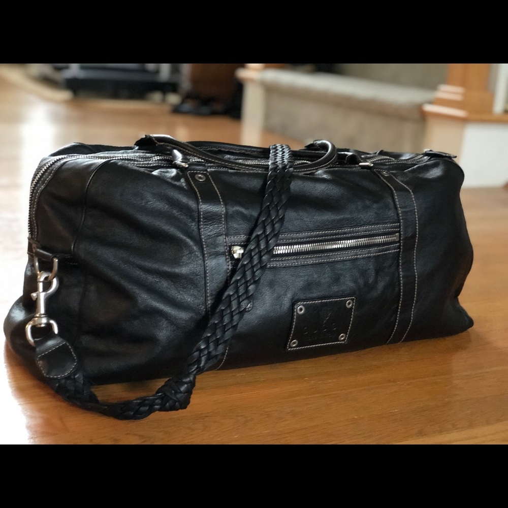 Men’s GUCCI leather duffle bag with braided strap